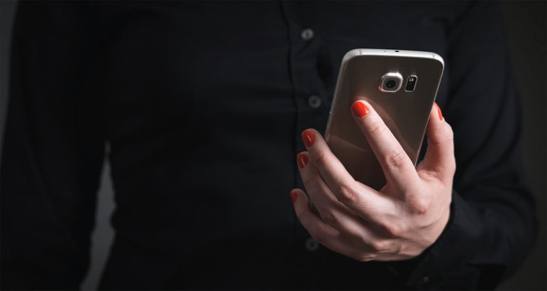 Person Holding Phone Person Holding Phone