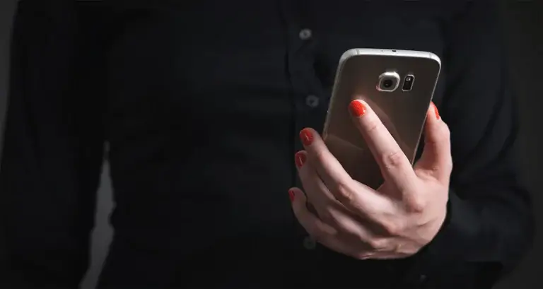 Person Holding Phone Person Holding Phone